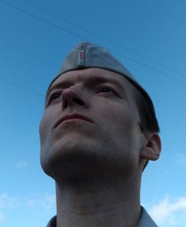 Ангел политики юноша Светлой Юстиции Алексей Рэдс Красное Солнце